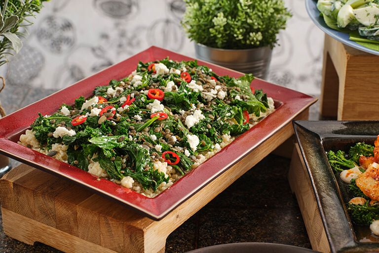 Platter of Kale, lentil, couscous, broccoli and feta salad.